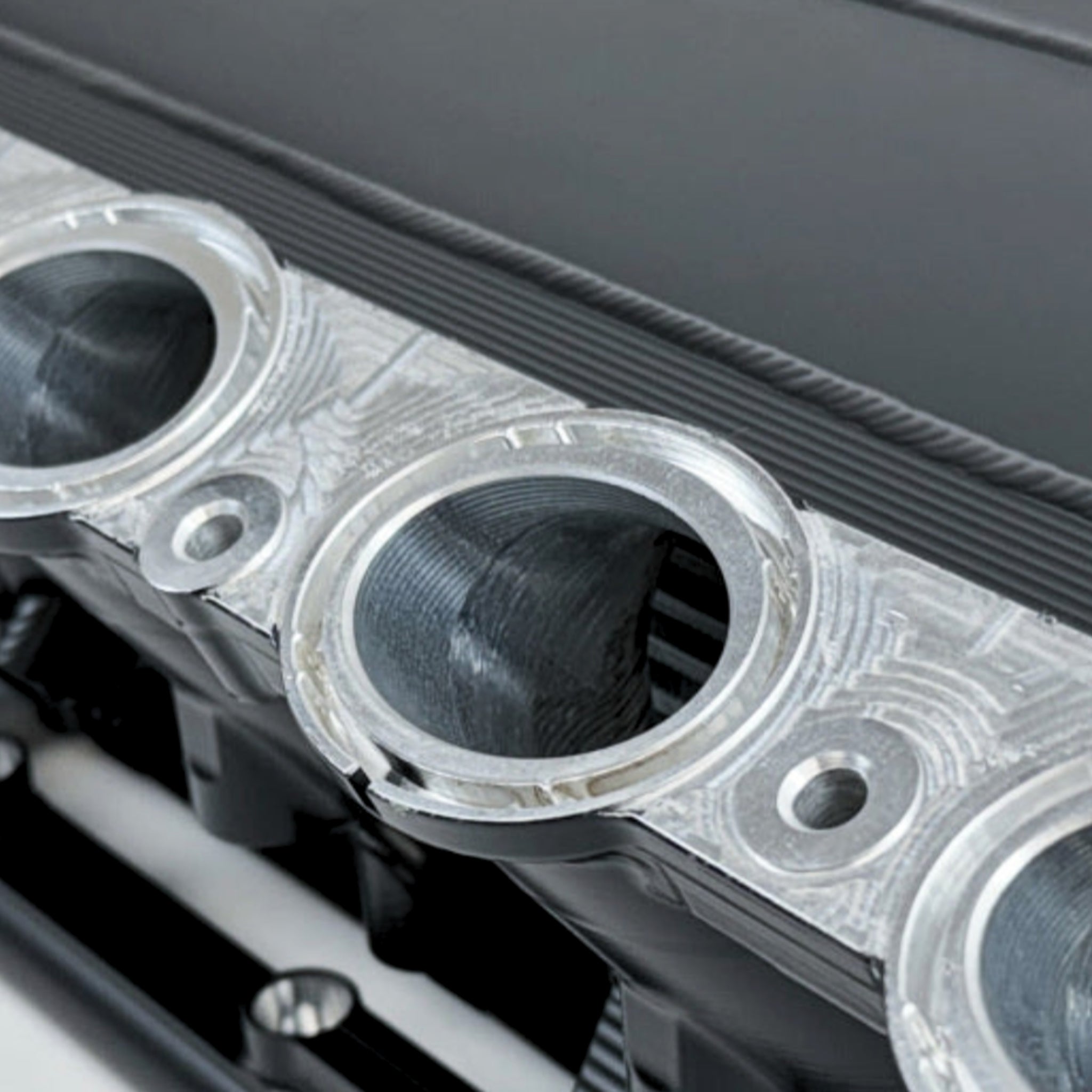 High-efficiency CSF Gen 2 B58 Race X charge air cooler manifold with thermal black coating – designed for BMW B58 engines