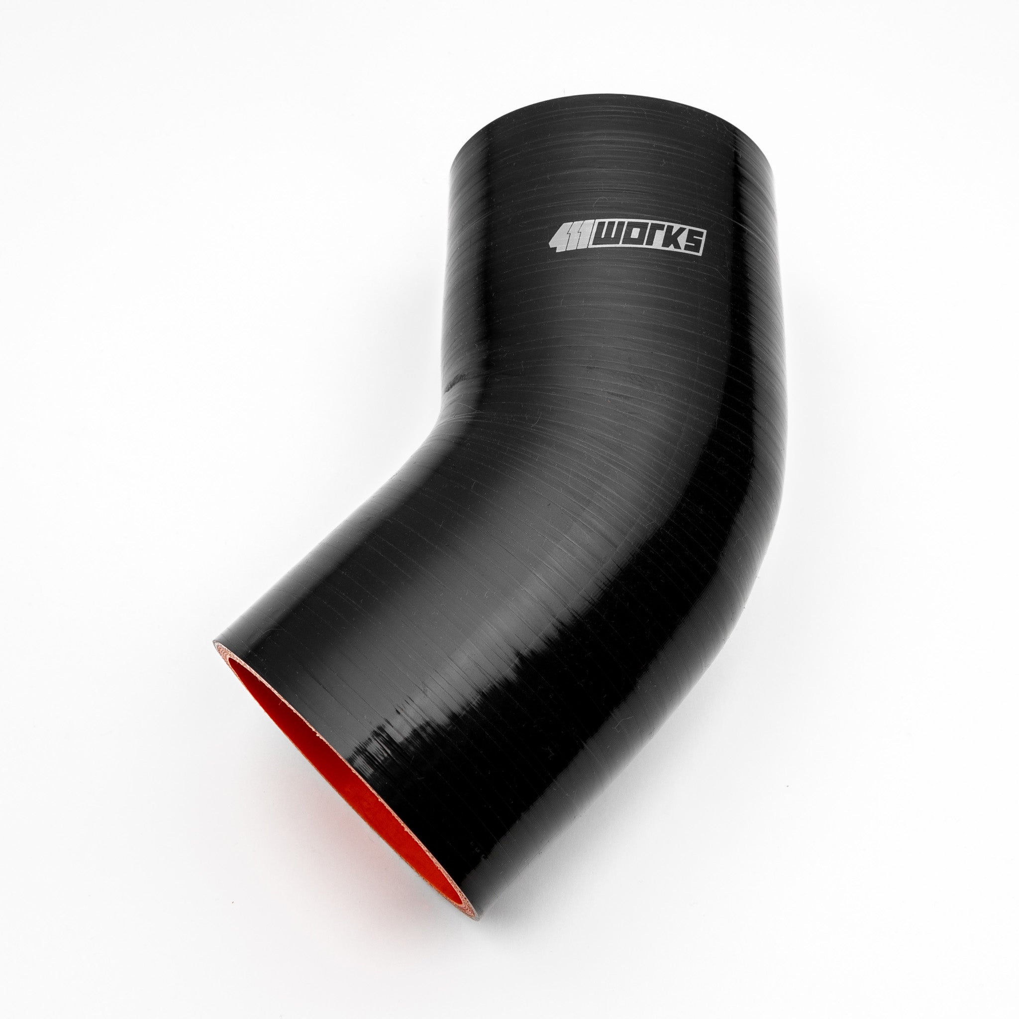 Black silicone hose with red interior on a white background