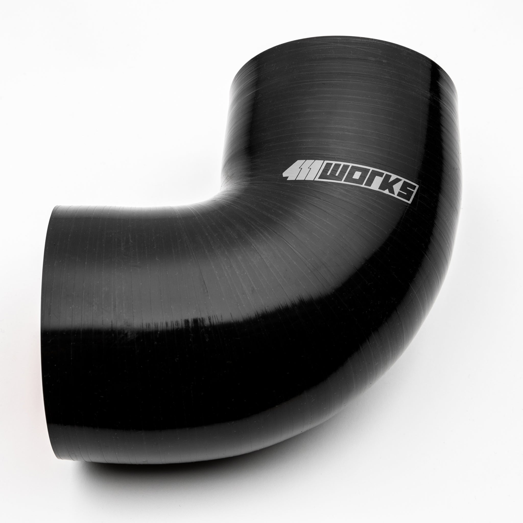 Black elbow-shaped metal pipe with '411 Works' branding on a white background