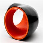 Black and red cylindrical object on a white background