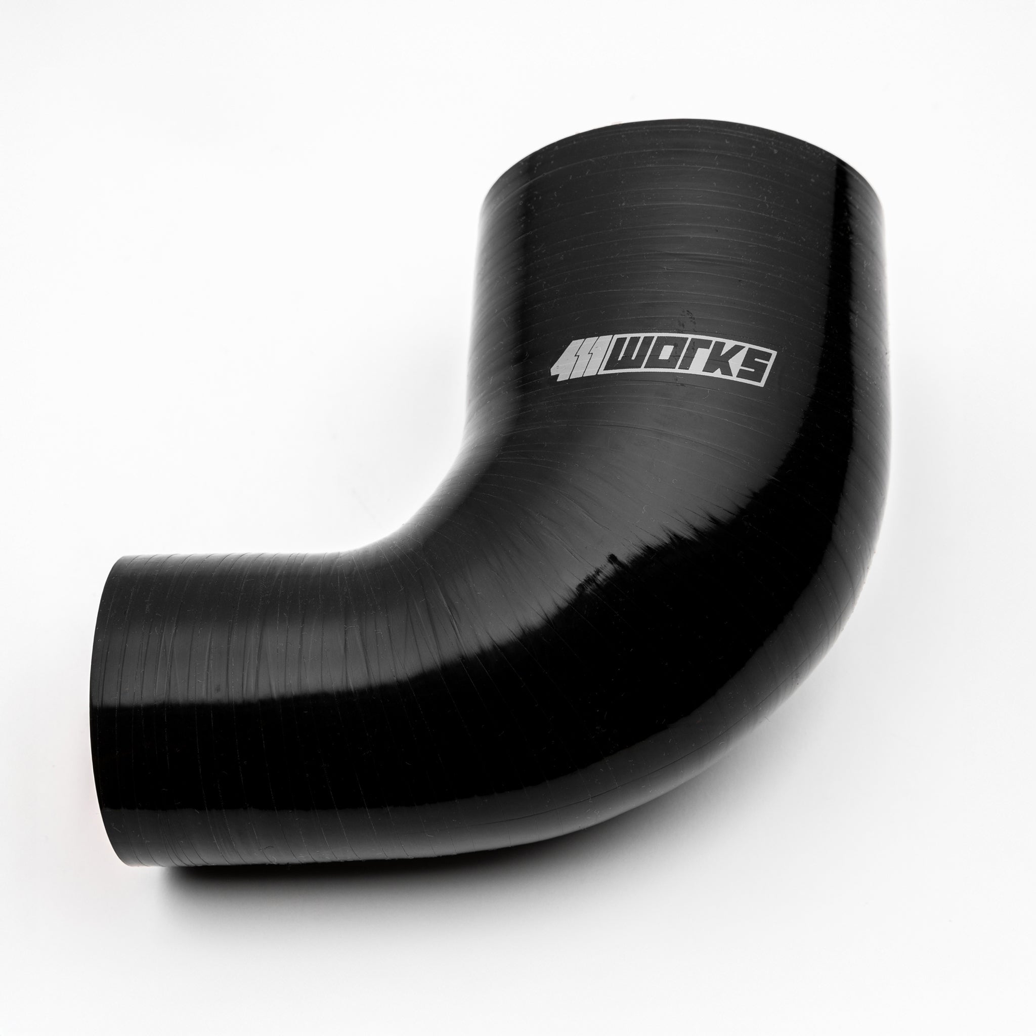 Black silicone hose with '411 Works' logo on a white background