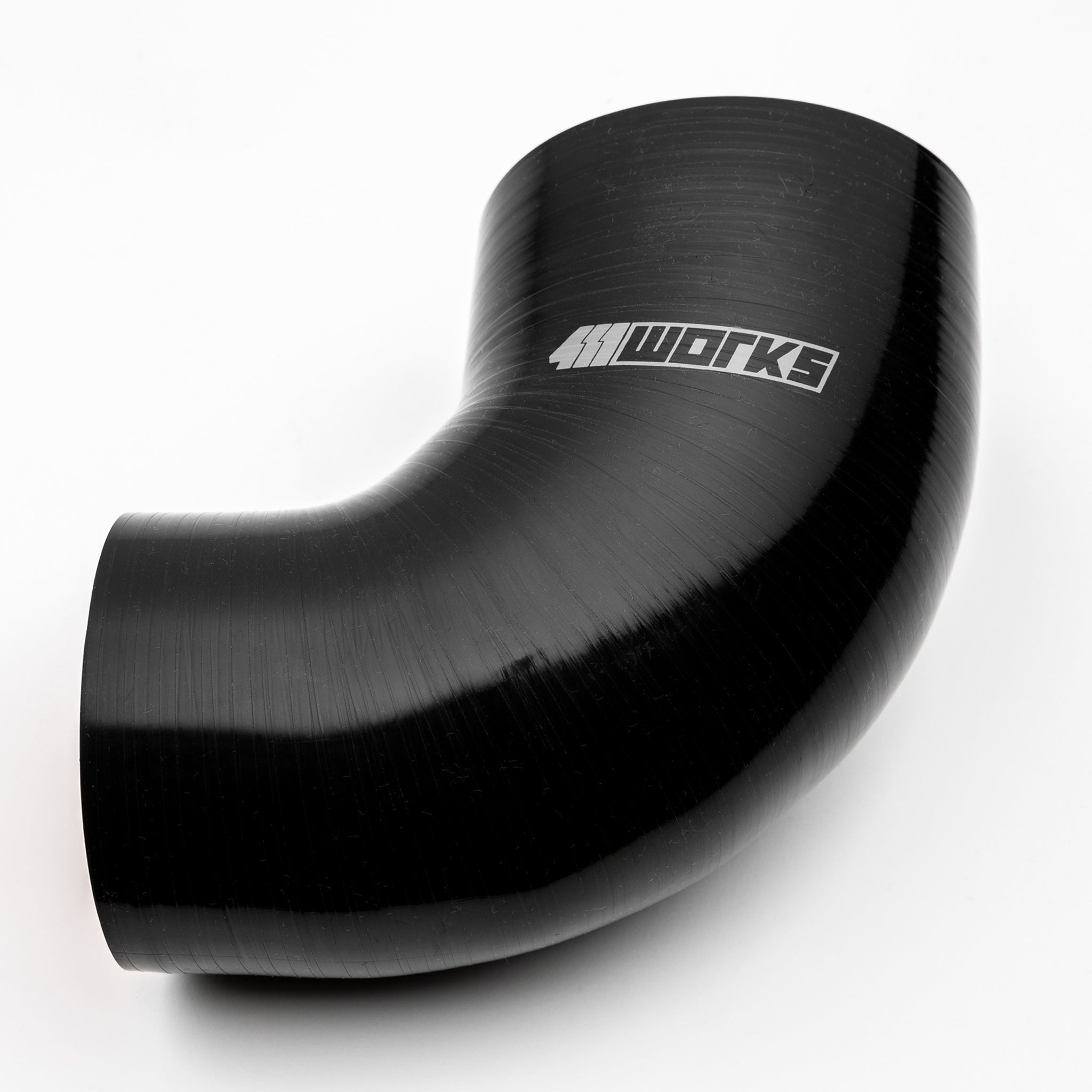 Black silicone hose with '411 Works' logo on a white background