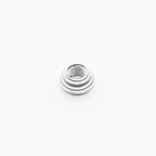 Metallic washer on a white background