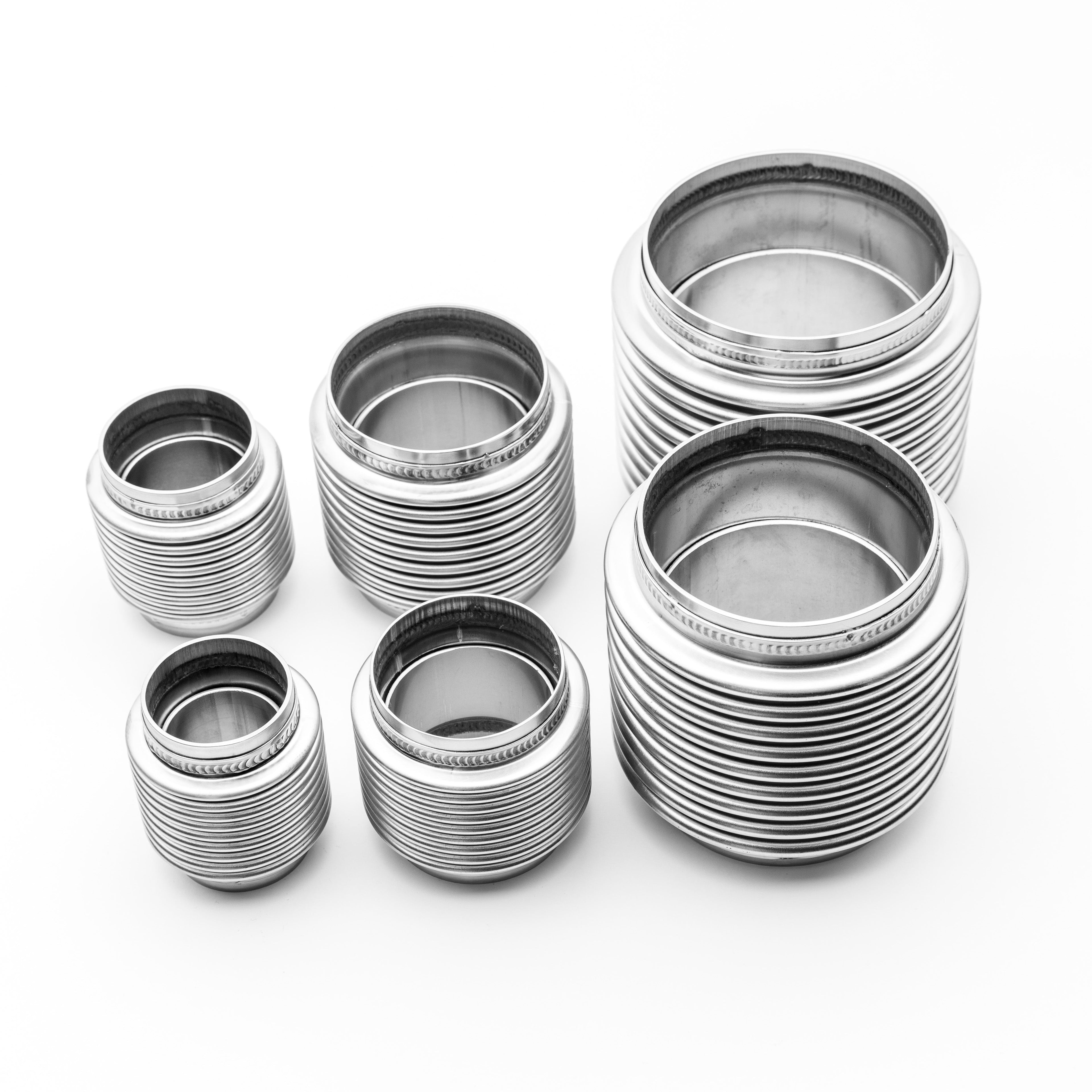 Set of metal bellow joint stacked on a white background