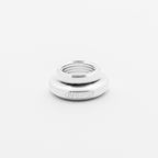 Silver metal bushing with '411 WORKS' branding on a white background