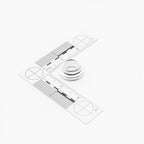 Small weld piece on a transparent ruler with measurement markings on a white background