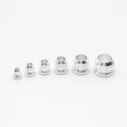 Set of silver metal fittings on a white background