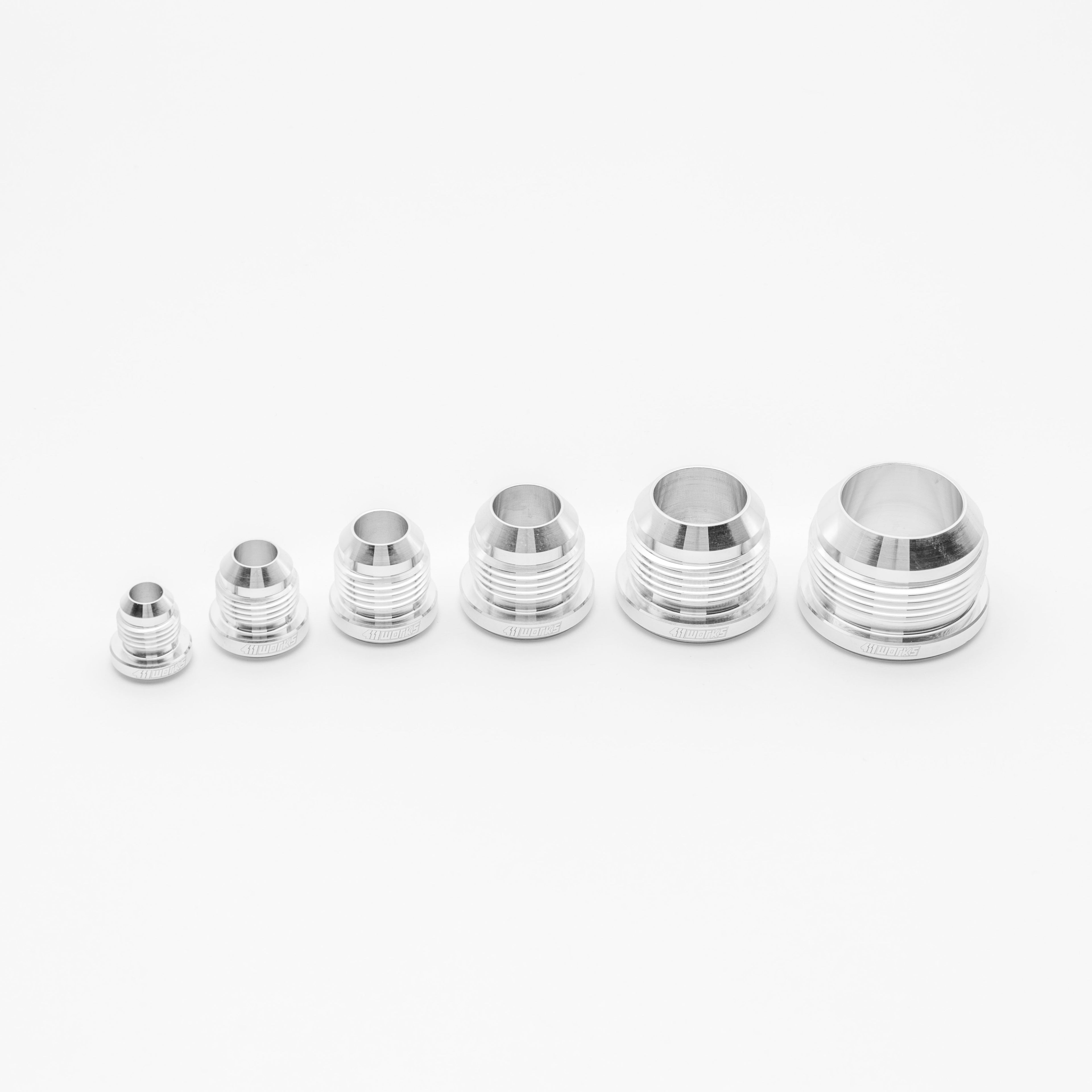 Set of silver metal fittings on a white background