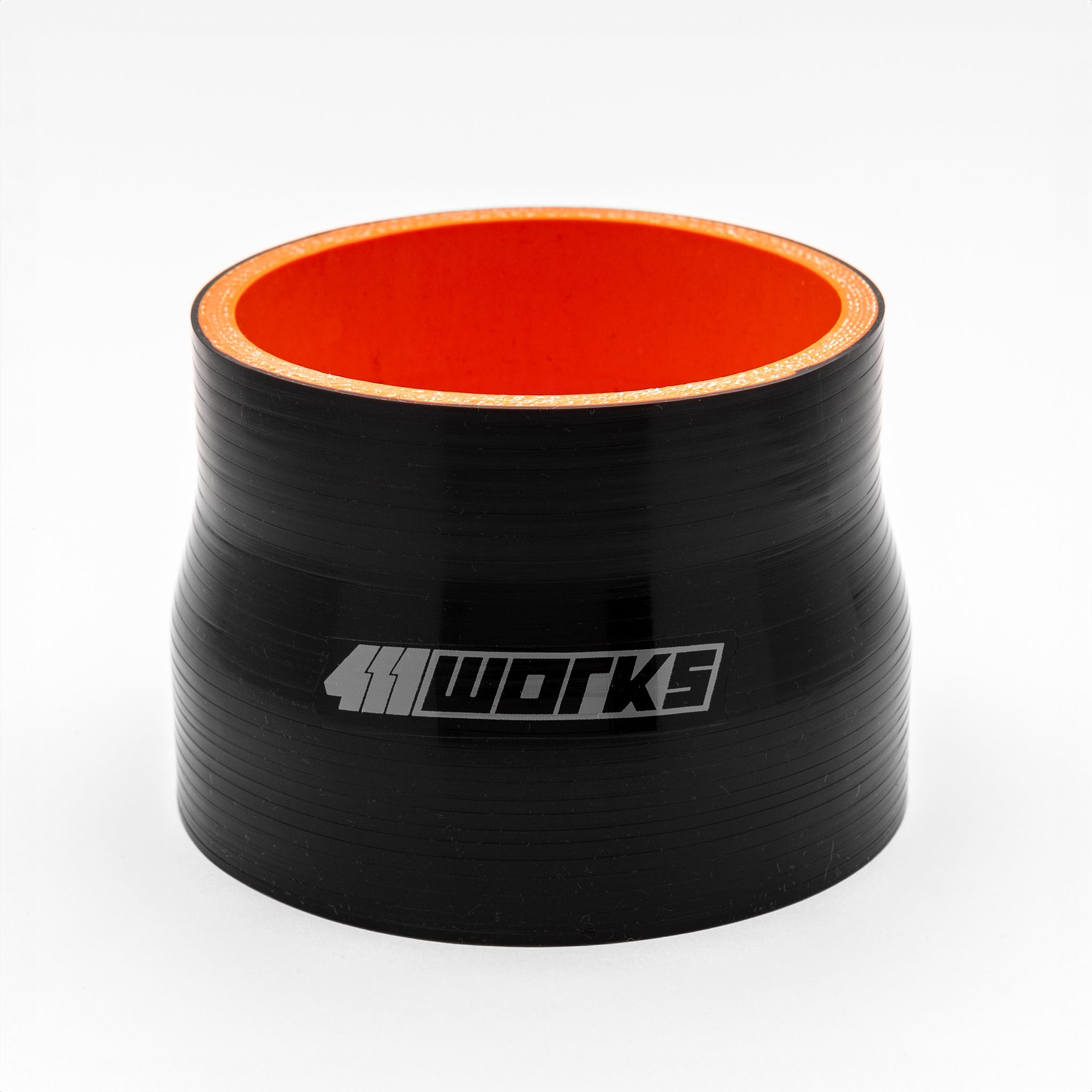 Black silicone hose with orange interior on a white background, featuring the '411 Works' logo.
