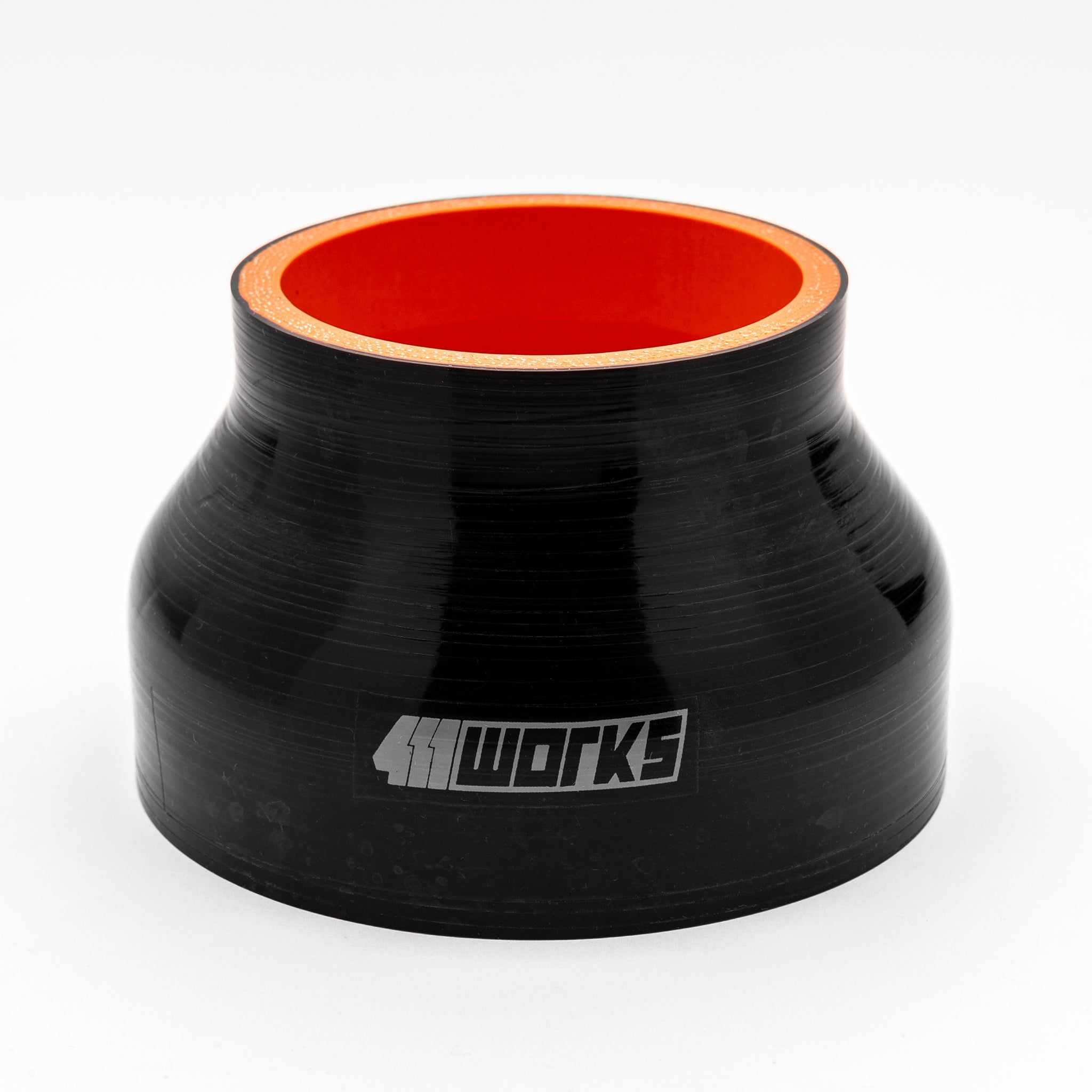 Black silicone hose with red interior on a white background, featuring the '411 Works' brand.