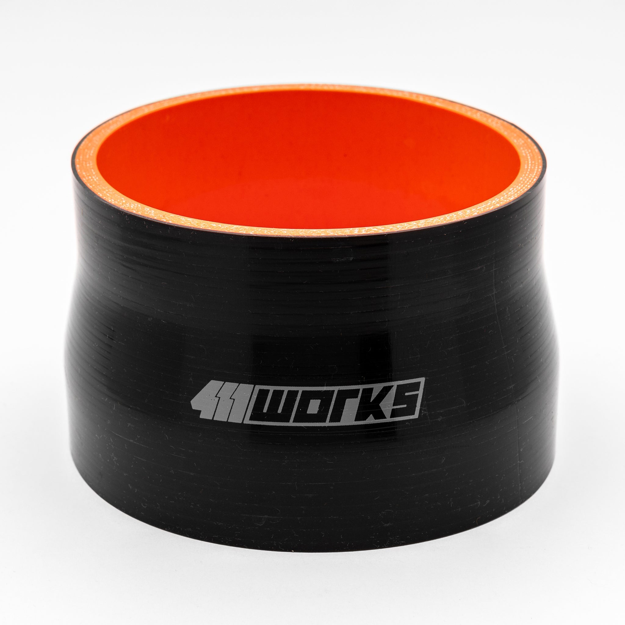 Black silicone hose with orange interior and '411 Works' logo on a white background