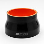 Black silicone hose with orange interior on a white background