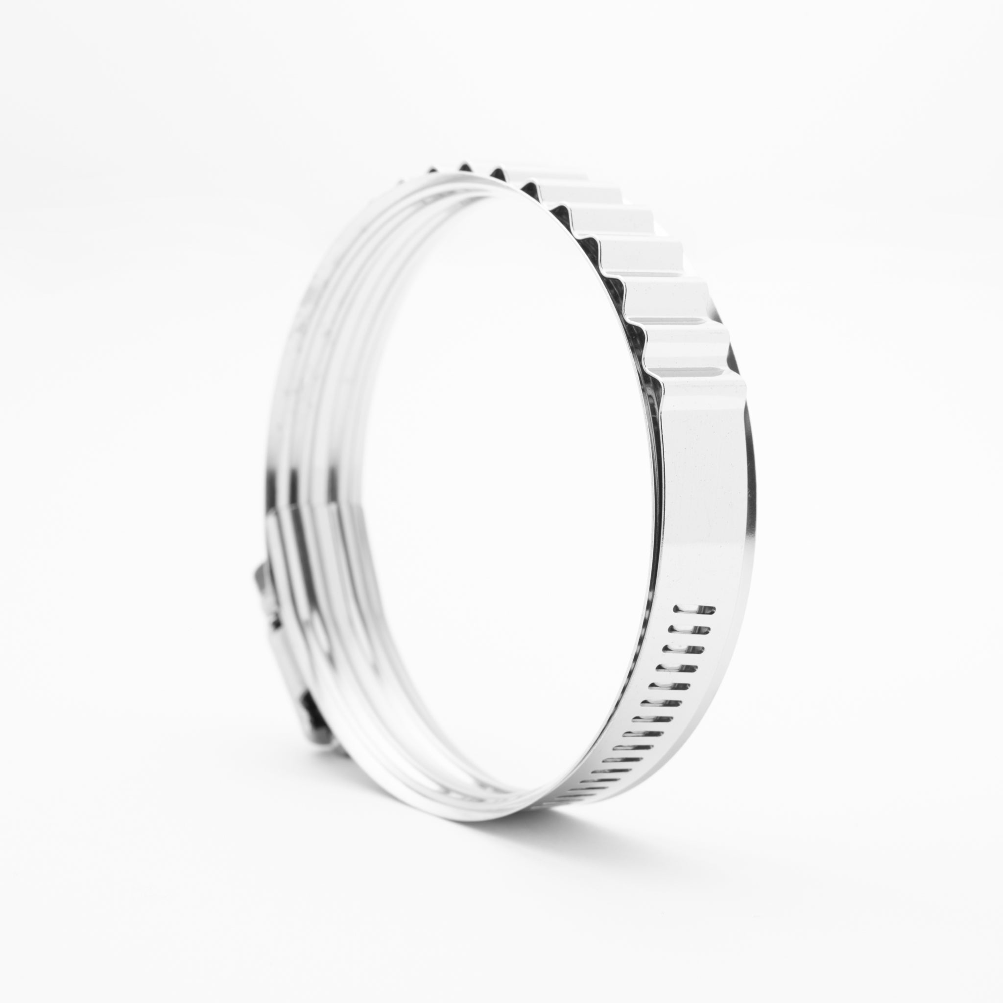 Silver clamp with a textured design on a white background