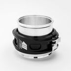 Metallic object with black and white branding on a white background