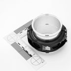 Mechanical component on a white background with measurement scale