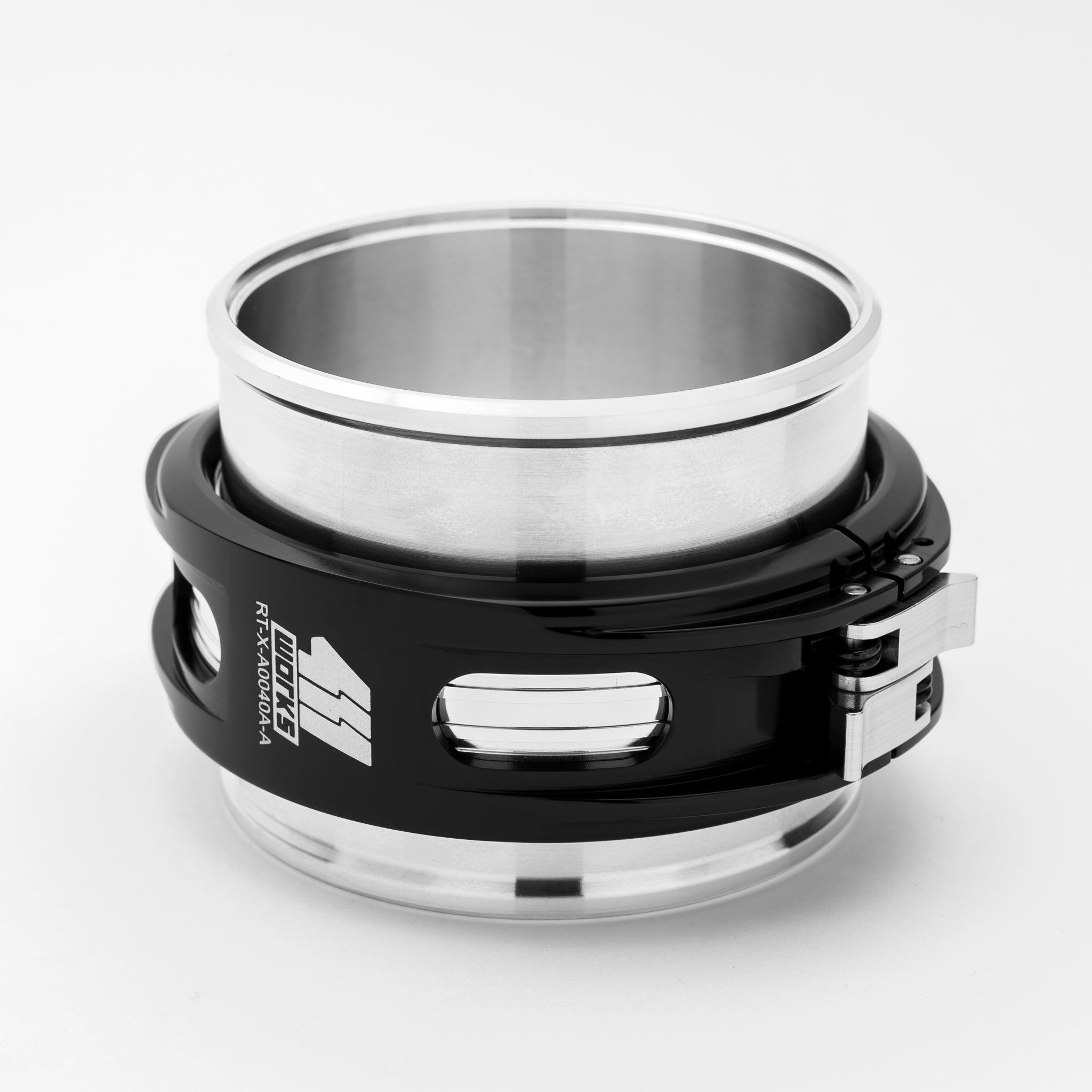 Metallic ring with black band and visible brand logo on a white background