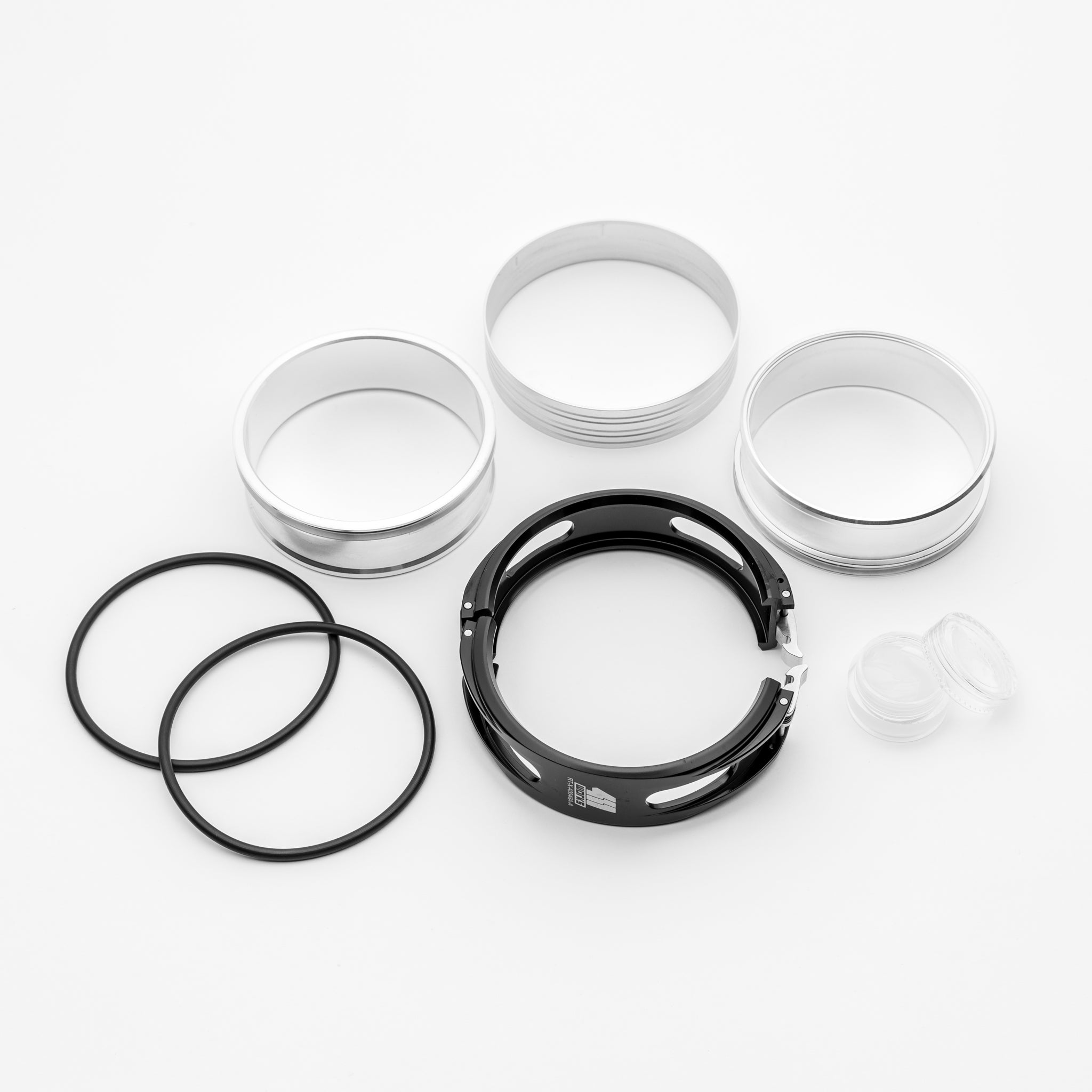 Mechanical components including clamp components on a white background