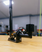 Black wildwood brake setup on a wooden surface with blurred background