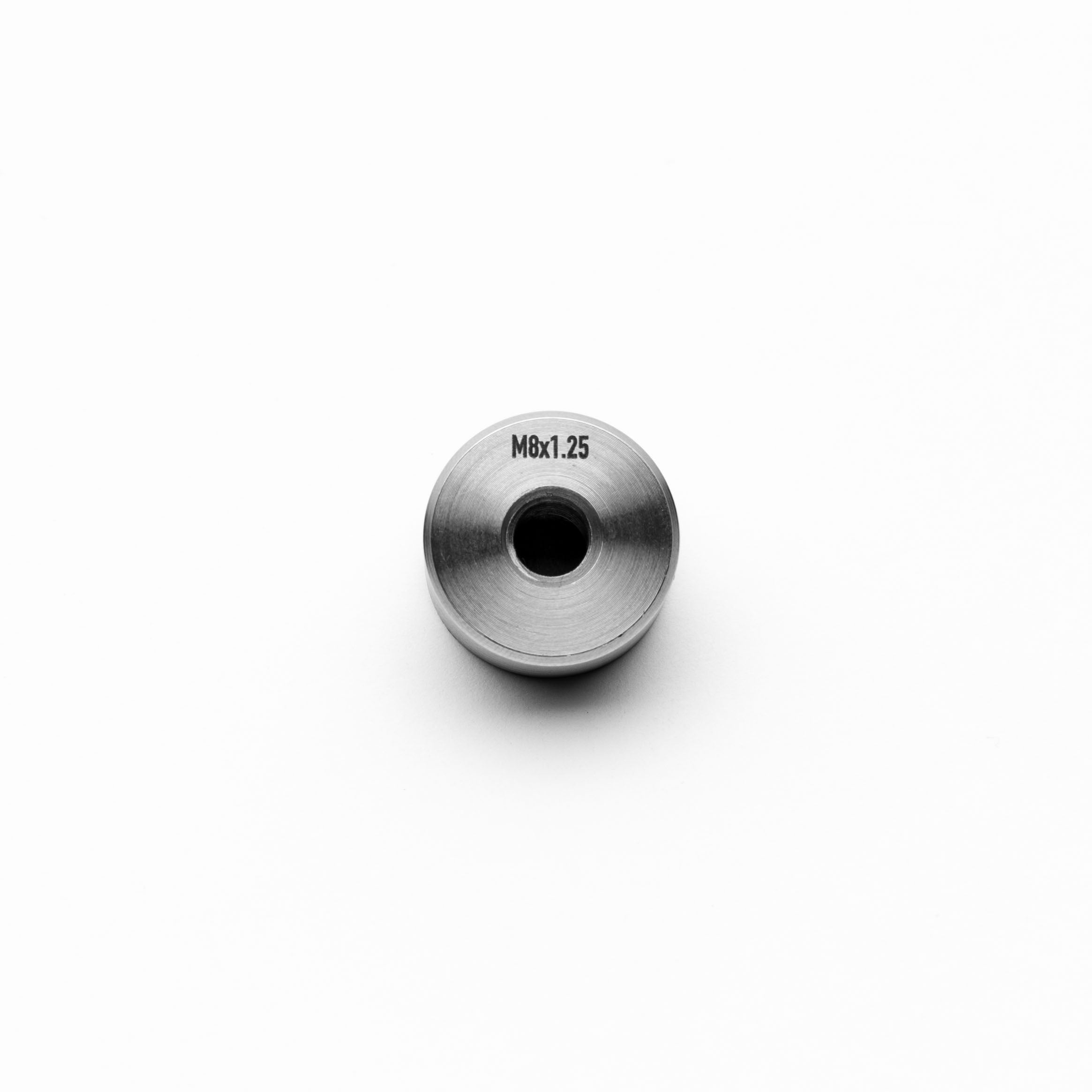 Metallic cylindrical component with 'M6x1.25' marking on a white background