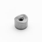 Metallic coped bung on a white background