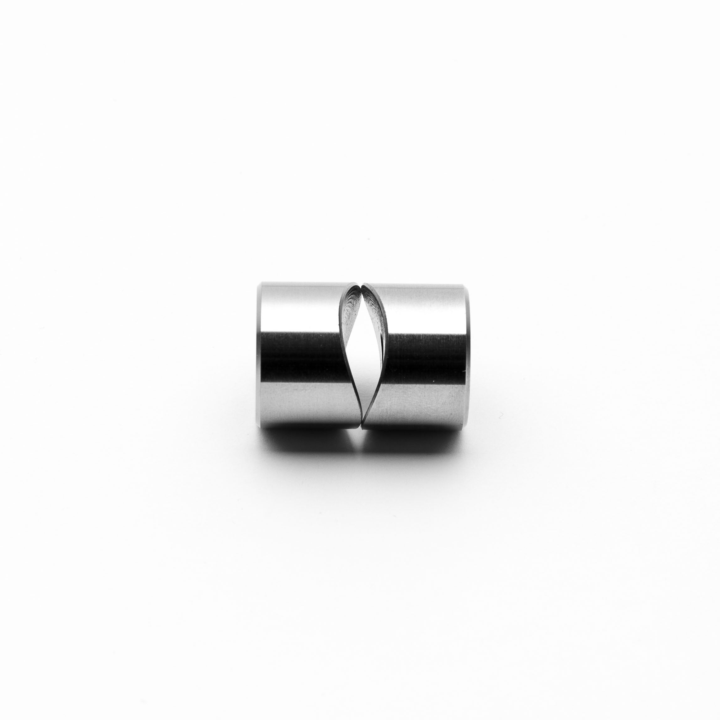 Silver weld bung coped design on a white background