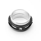 Mechanical component with black and silver design on a white background