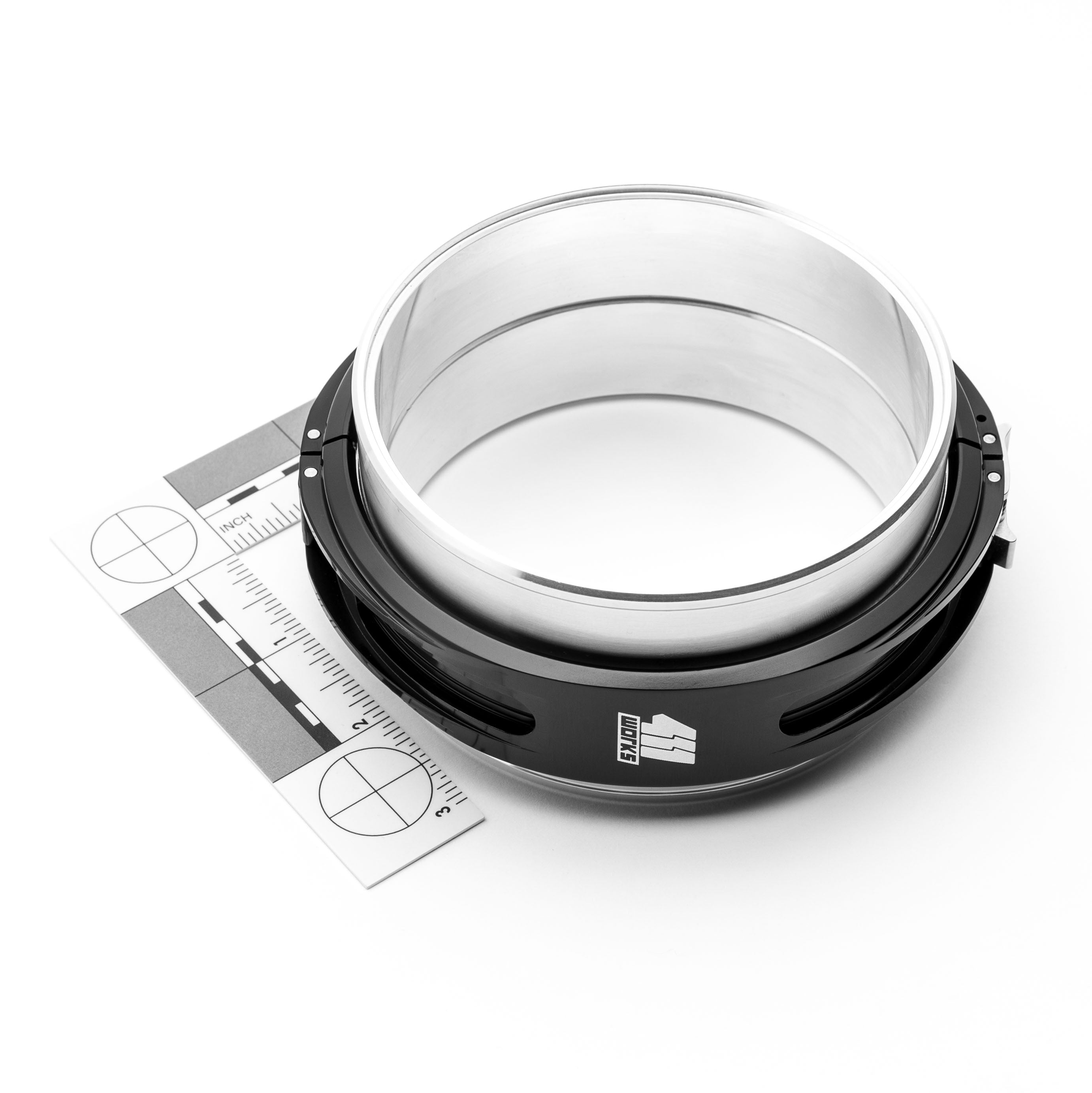 Clamp with a ruler on a white background