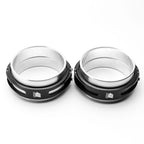 Two black clamps on a white background