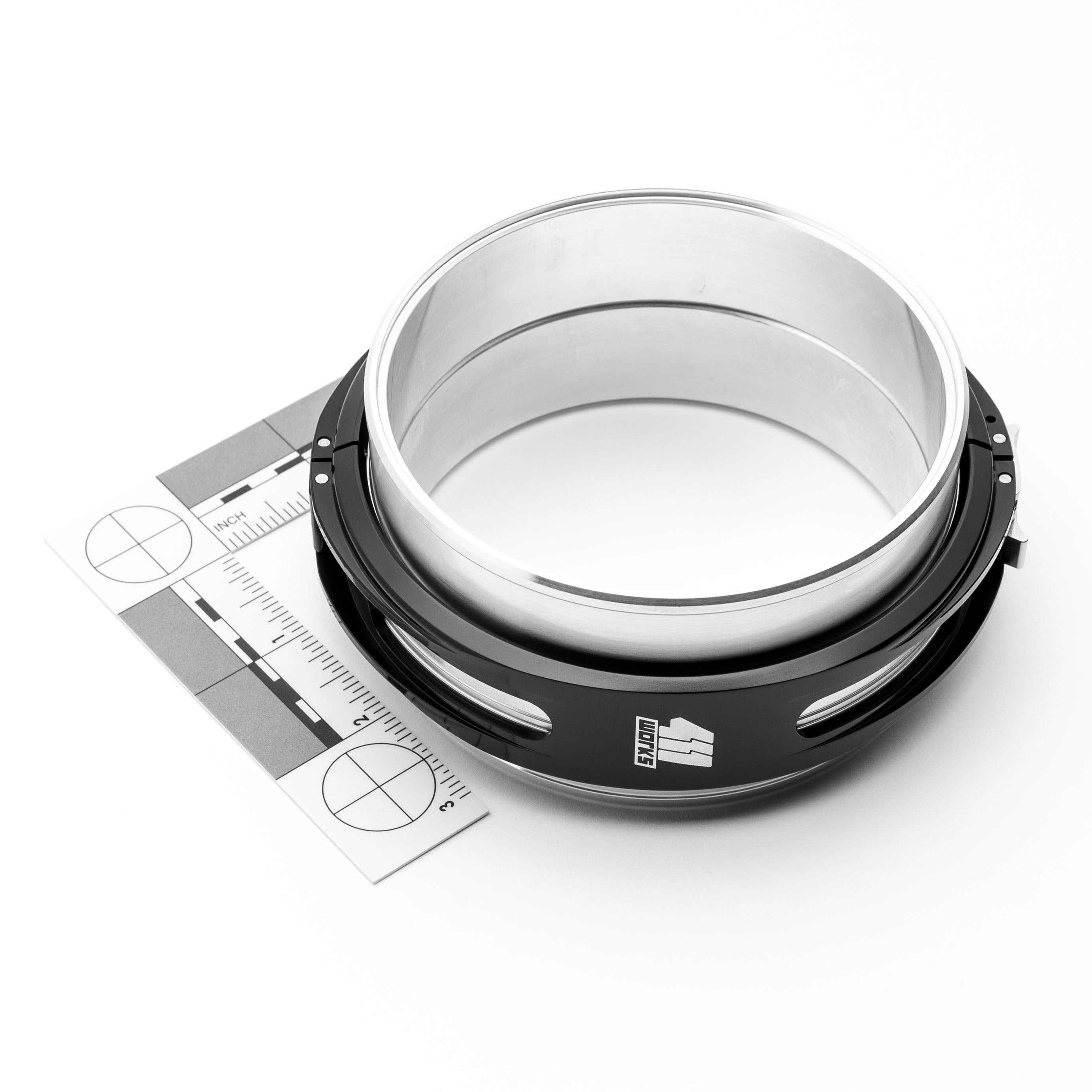 Black and white circular clamp with measurement tool on a white background