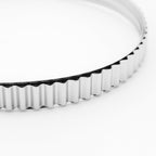 Close-up of a silver clamp on a white background