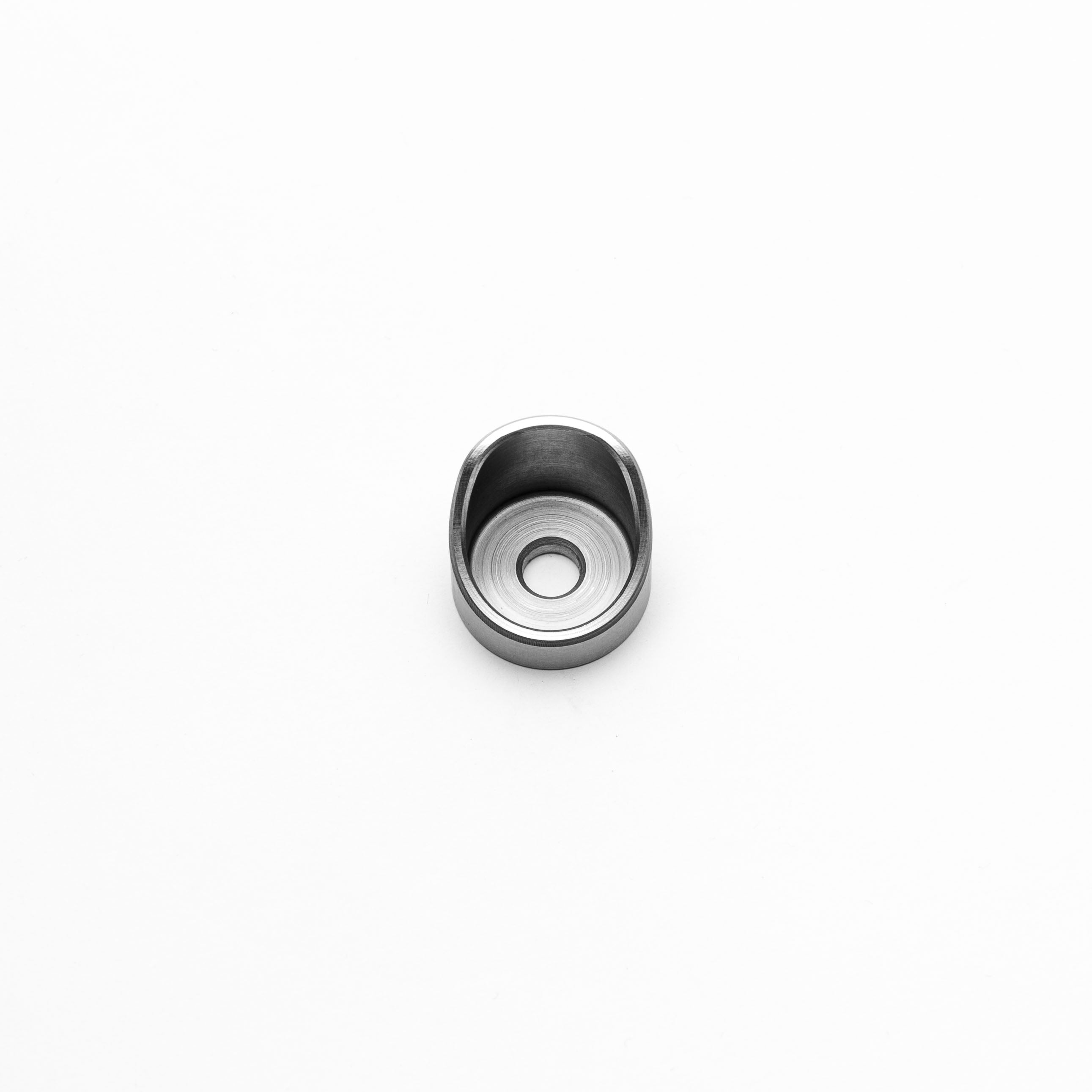 Metallic scallop circle on a white background