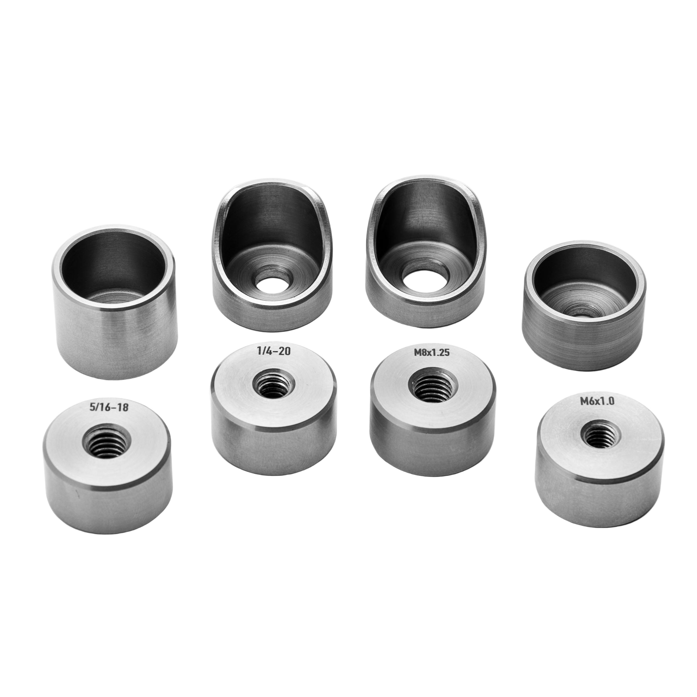 Set of metal threaded bungs with threaded holes on a white background