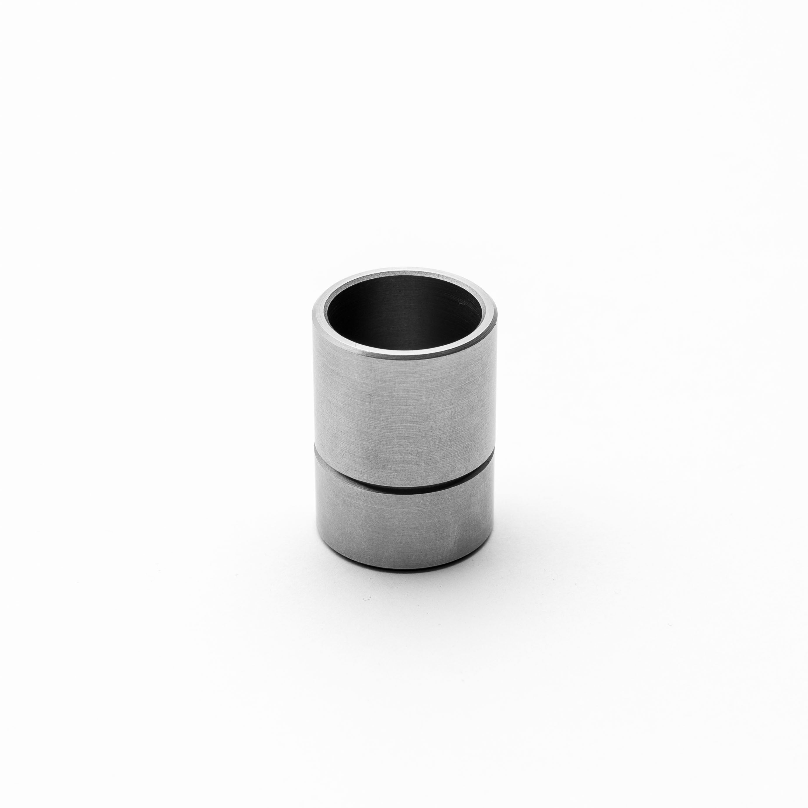 Metallic threaded bung object on a white background