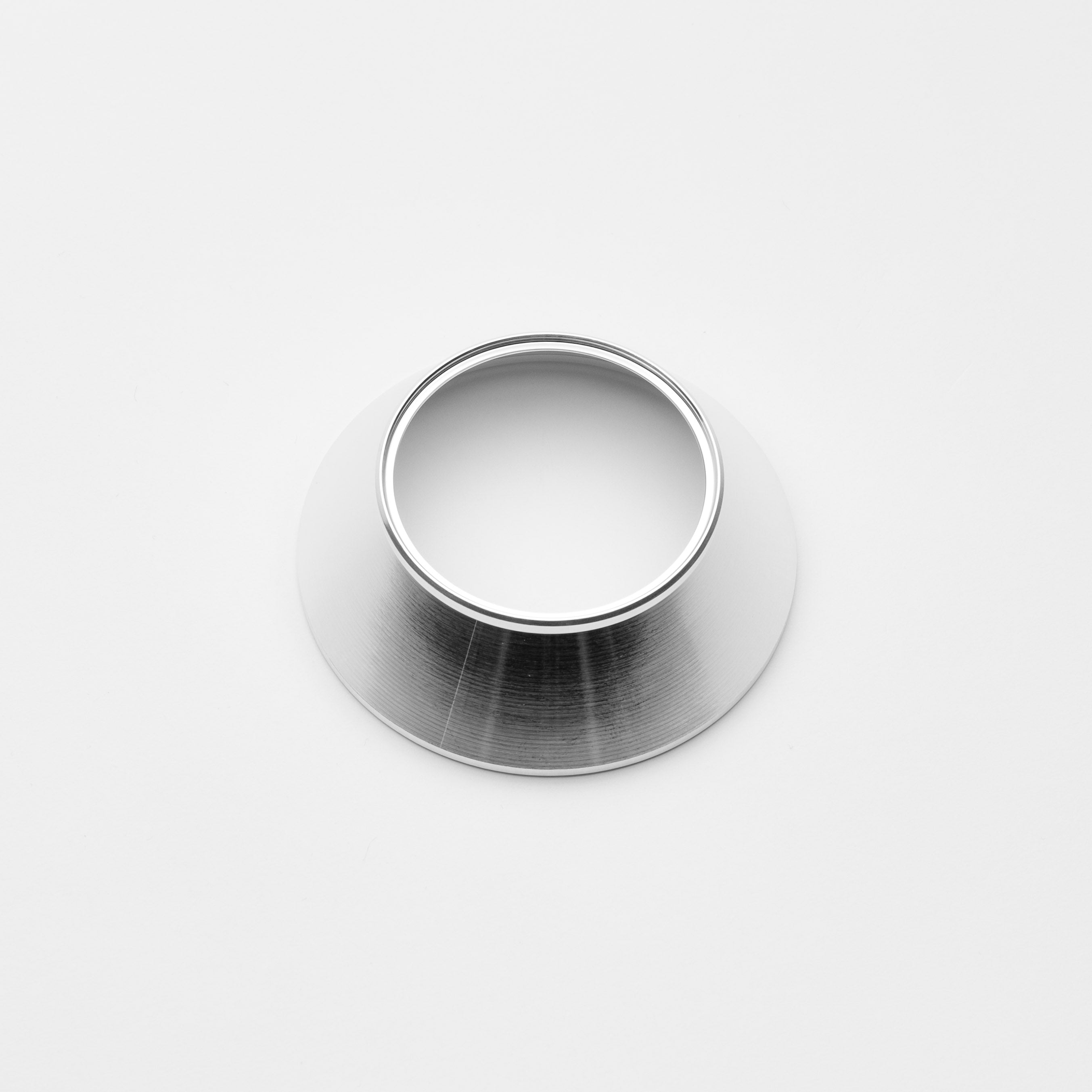 Metallic weld on reducer on a white background