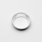 Silver transition on a light gray background