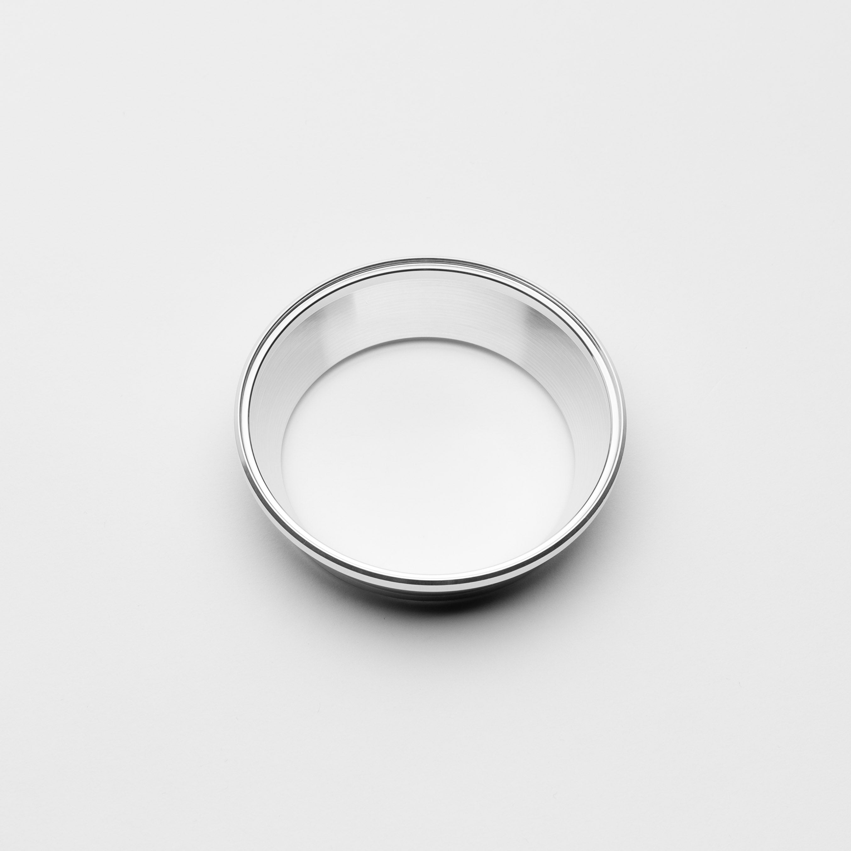 Silver transition on a light gray background