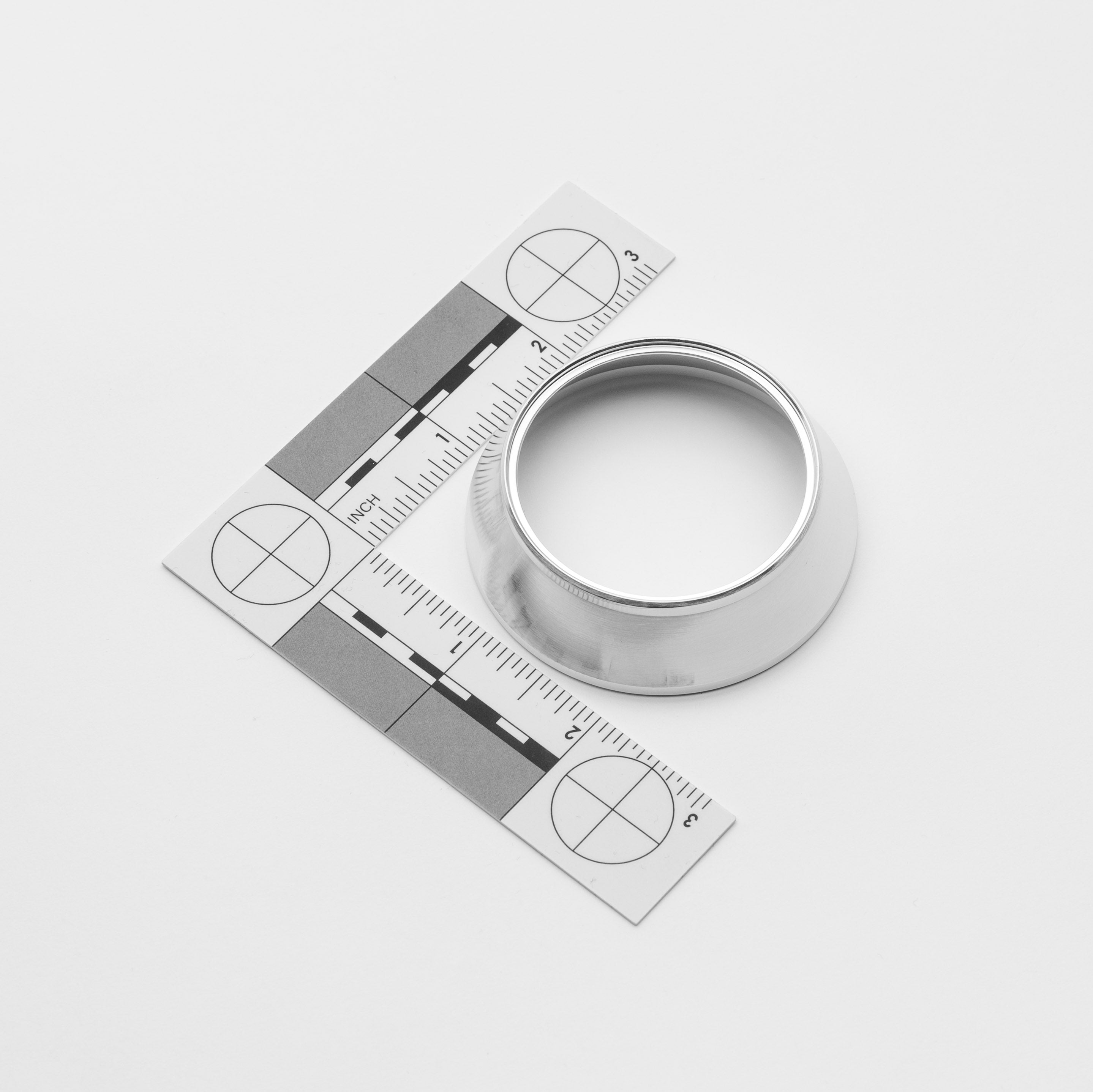 Weld on reducer with measurement tool on a white background