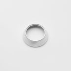 Silver weld on reducer on a light gray background