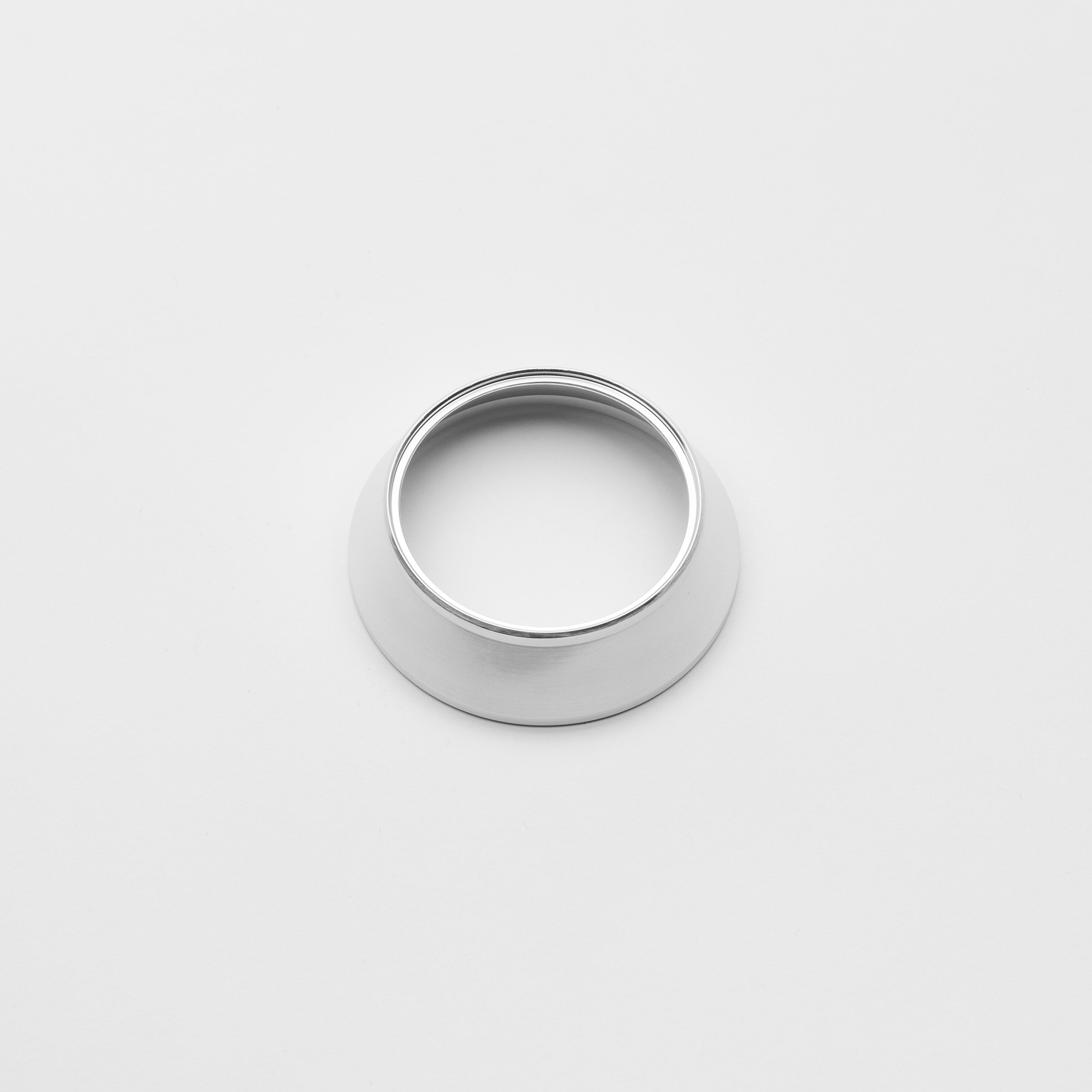 Silver weld on reducer on a light gray background