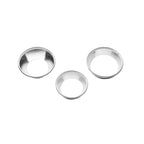 Three metallic reducers of different sizes on a white background