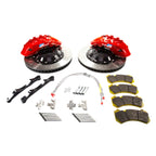 Alcon Nissan Brake system components including red calipers, rotors, and brake pads on a white background.