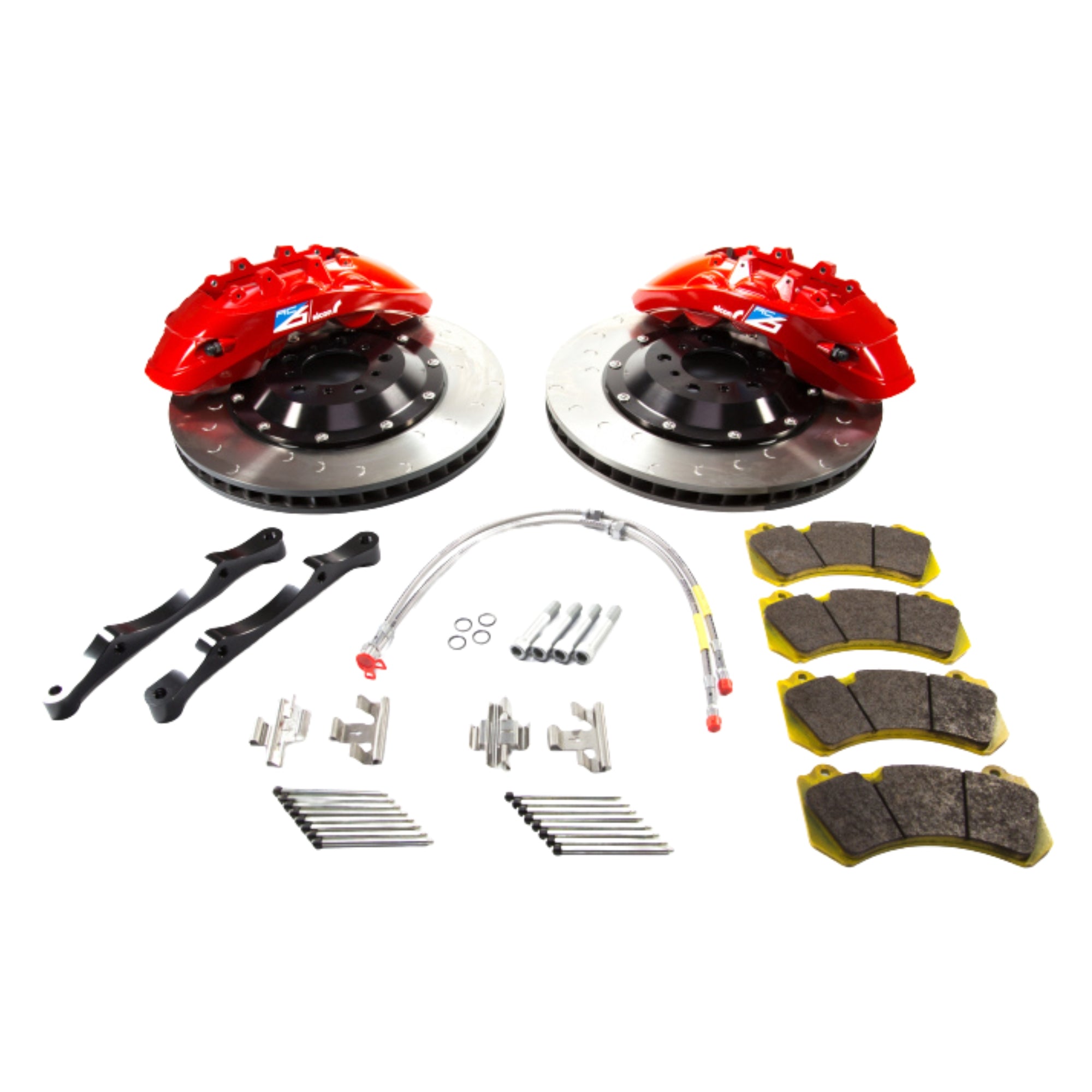 Alcon Nissan Brake system components including red calipers, rotors, and brake pads on a white background.
