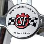 Metallic valve cap with 'CSF' logo and safety instructions on a white background