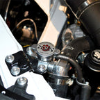 Close-up of a car Toyota GR86 engine with 'CSF' branded components.