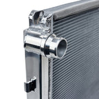 Close-up of a metallic radiator with a white background