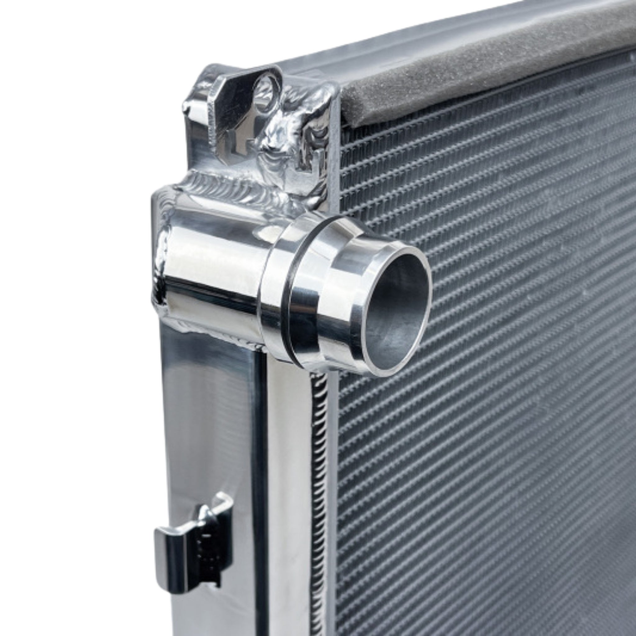 Close-up of a metallic radiator with a white background