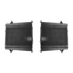 Two black metal radiators on a white background for Toyota GR Supra 