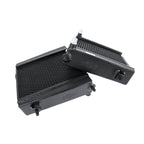 Two black metal radiators on a white background for Toyota GR Supra performance