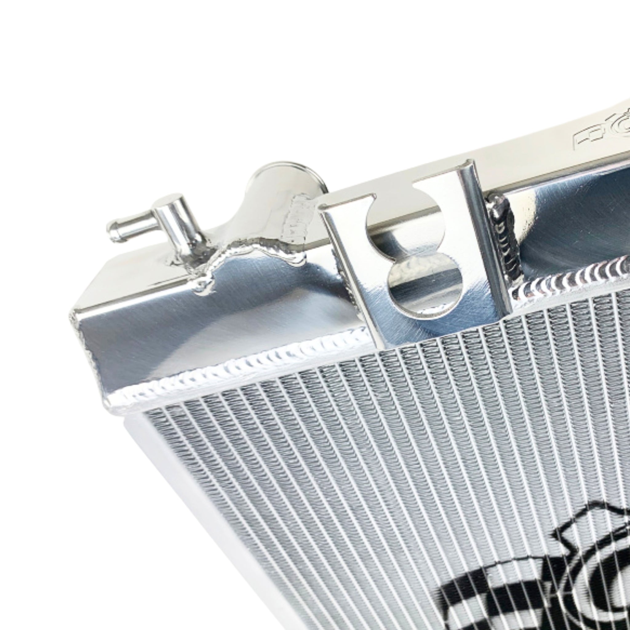 Close-up of a metallic radiator with a brand logo on a white background