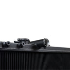 Close-up of a black radiator on a white background